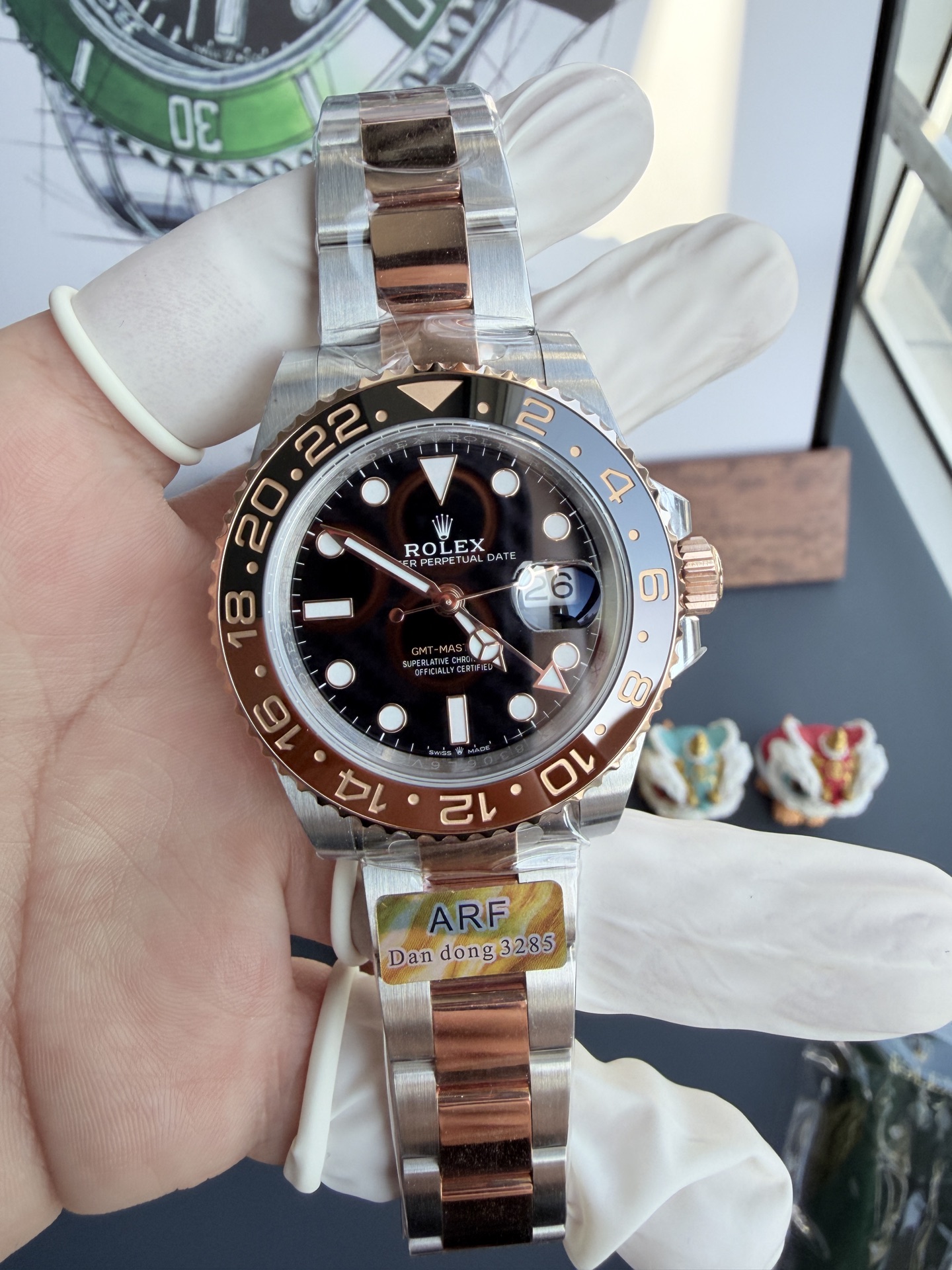 Đồng hồ Rolex GMT-Master II Root Beer Demi Gold Dây Oyster Rep 1:1 180g AR Factory 40mm | WATCHREPLICAEXPERT